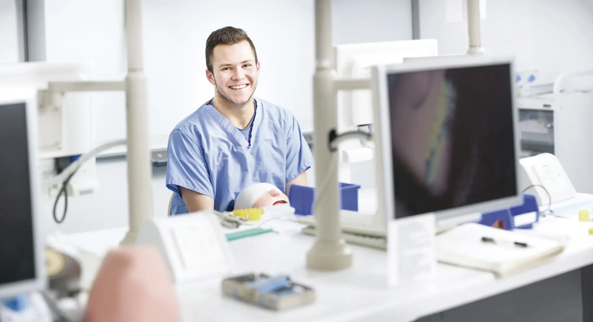 Student  dental assistant learning at Inverness College UHI